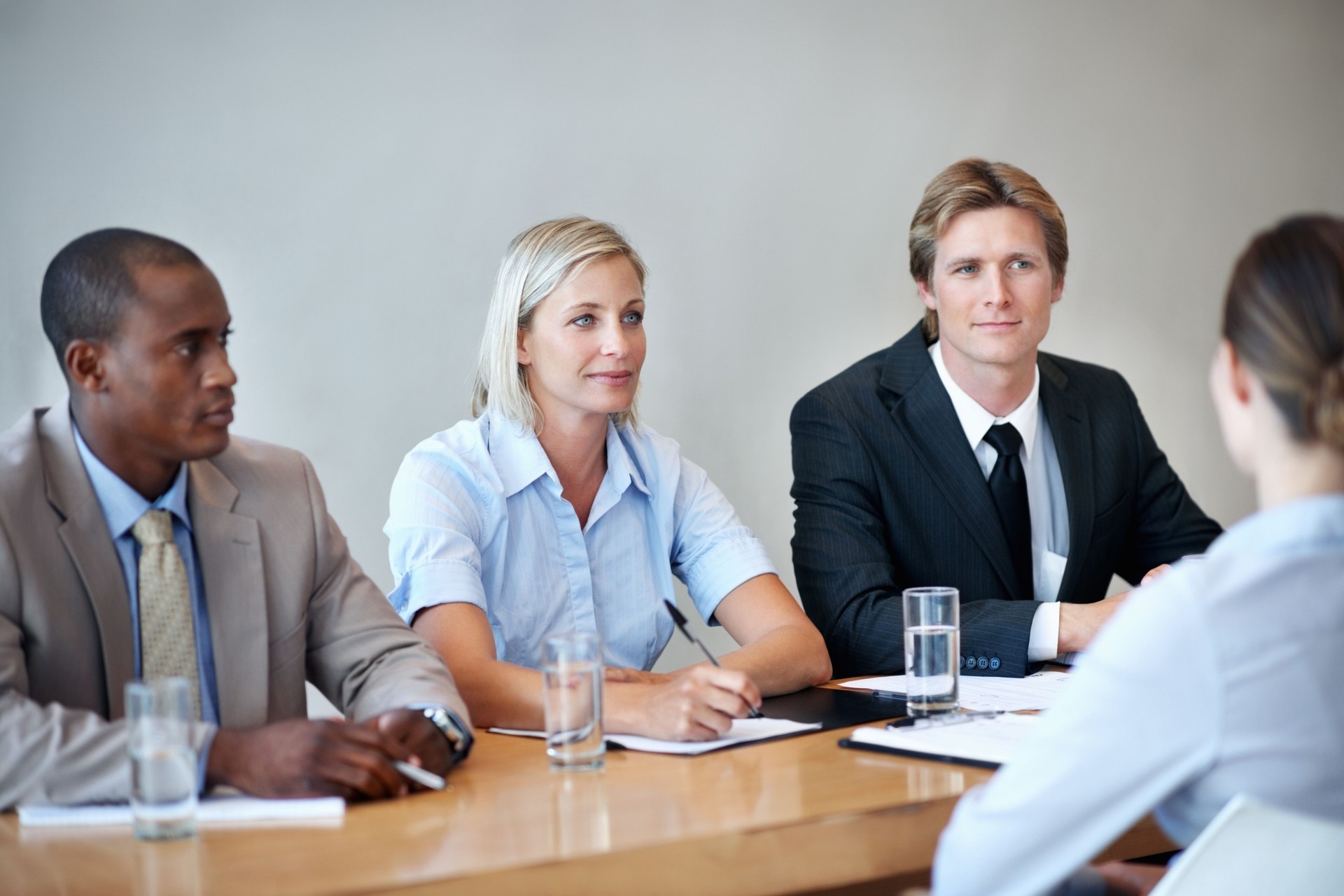 Business people conducting an interview for applicant